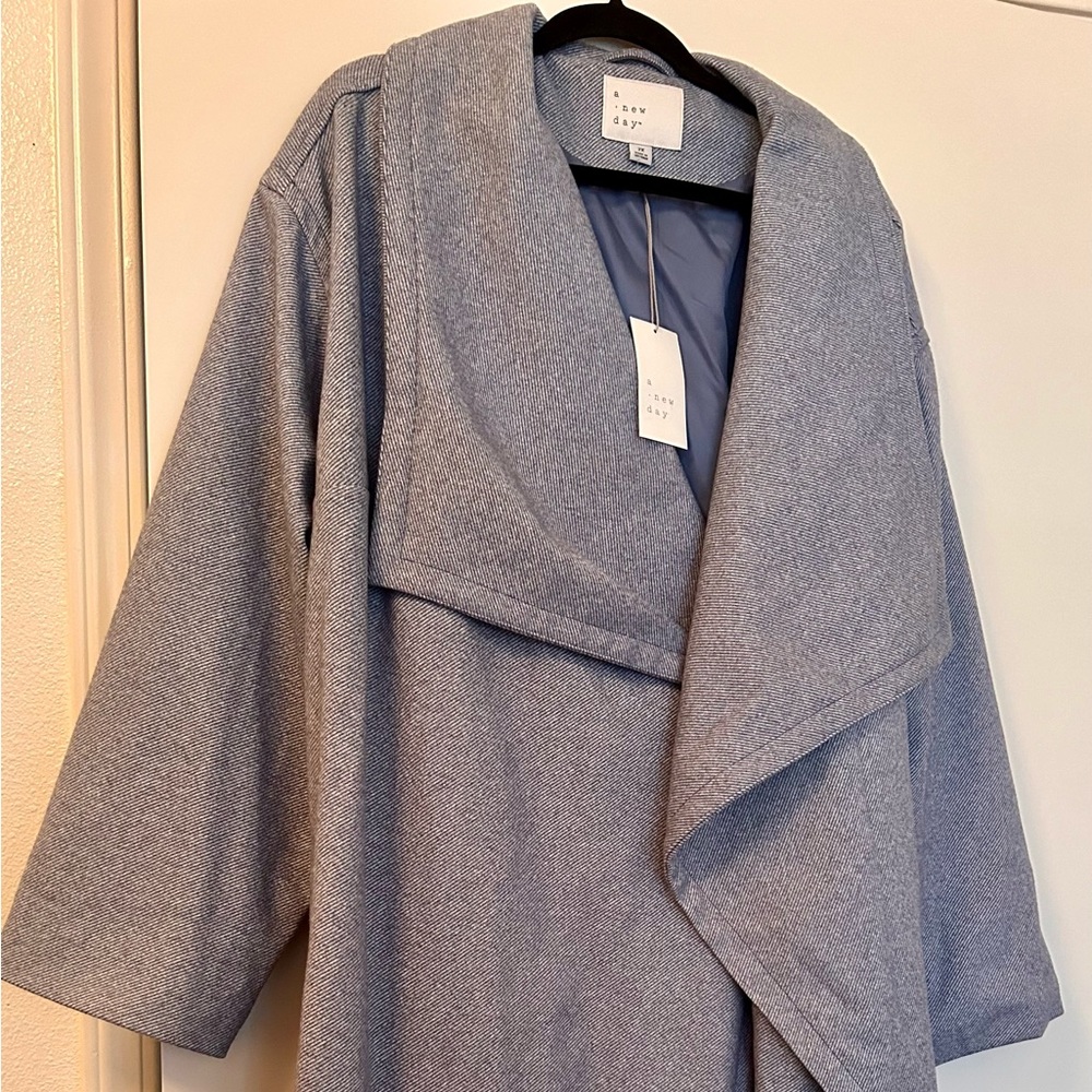 Long wrap coat 🧥. Very nice thick and new. Size 2x can go up to size 4x. NWOT